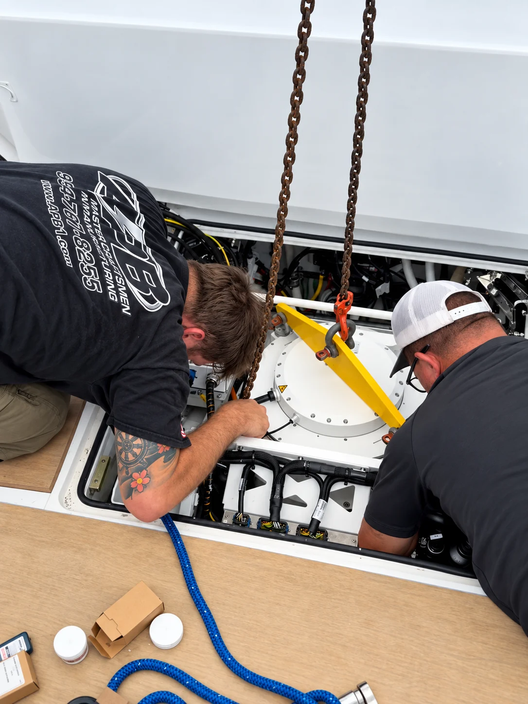 APB technicians installing Smartgyro aboard Chelsea Rae